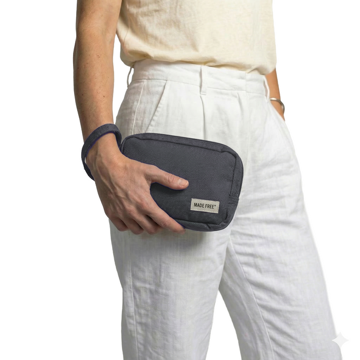 MADE FREE Adventure Case AW in charcoal worn by model in studio setting