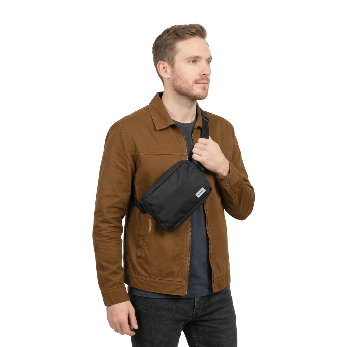 MADE FREE Hip Pack AW in charcoal worn by model in studio setting