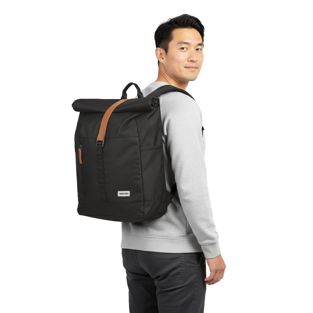 MADE FREE Roll Pack AW in charcoal worn by model in studio setting